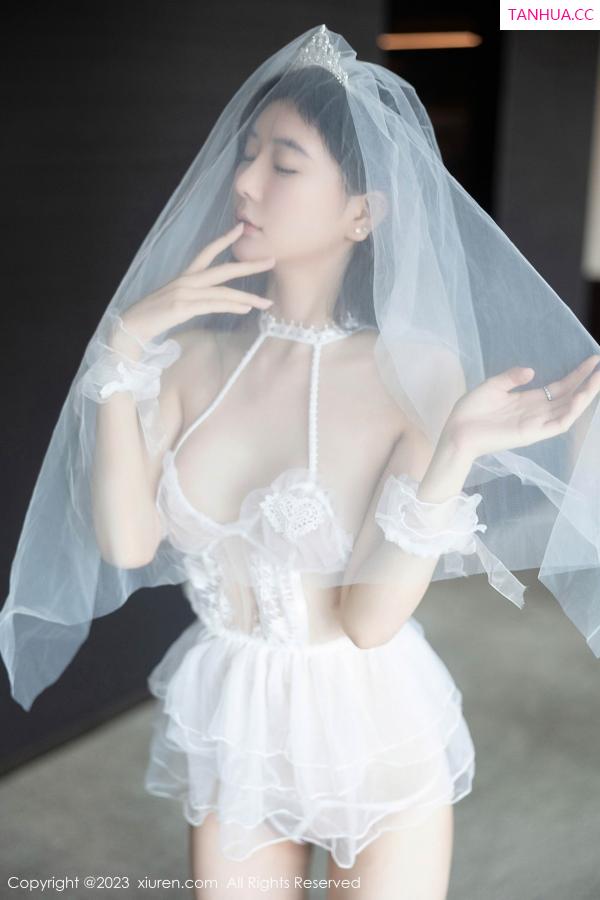   [XiuRen]高清写真图 2023.07.31 No.7165 幼幼 婚纱丝袜第6张图片